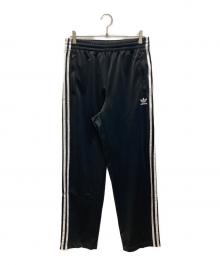 adidas（アディダス）の古着「アディカラー クラシックス ファイヤーバード トラックパンツ」｜ブラック