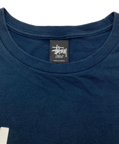 stussy（ステューシー）stussy (ステューシー) プリントTシャツ ネイビー サイズ:LARGEの古着・服飾アイテム