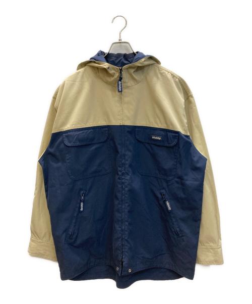 stussy（ステューシー）stussy (ステューシー) バイカラーフーデッドジャケット ベージュ×ネイビー サイズ:SIZE Mの古着・服飾アイテム