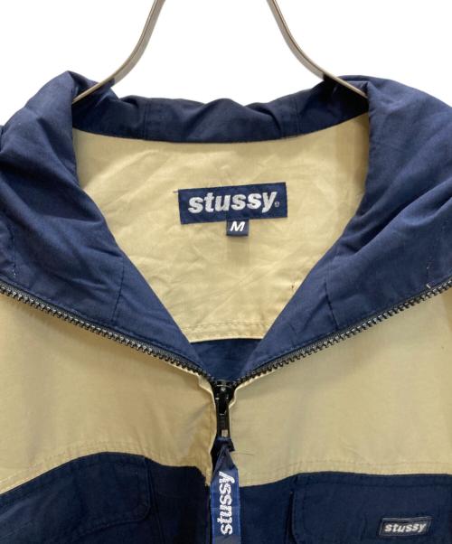 stussy（ステューシー）stussy (ステューシー) バイカラーフーデッドジャケット ベージュ×ネイビー サイズ:SIZE Mの古着・服飾アイテム