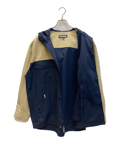 stussy（ステューシー）stussy (ステューシー) バイカラーフーデッドジャケット ベージュ×ネイビー サイズ:SIZE Mの古着・服飾アイテム