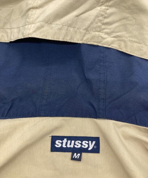 stussy（ステューシー）stussy (ステューシー) バイカラーフーデッドジャケット ベージュ×ネイビー サイズ:SIZE Mの古着・服飾アイテム