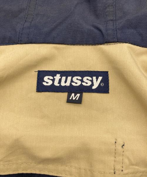 stussy（ステューシー）stussy (ステューシー) バイカラーフーデッドジャケット ベージュ×ネイビー サイズ:SIZE Mの古着・服飾アイテム