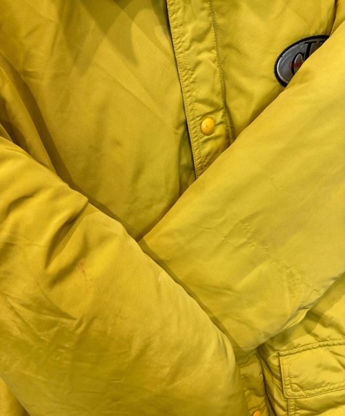 ck Calvin Klein（シーケーカルバンクライン）ck Calvin Klein (シーケーカルバンクライン) ロゴパッチダウンジャケット　CJ 86064 イエロー サイズ:Mの古着・服飾アイテム