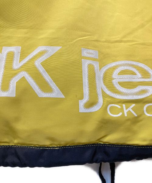 ck Calvin Klein（シーケーカルバンクライン）ck Calvin Klein (シーケーカルバンクライン) ロゴパッチダウンジャケット　CJ 86064 イエロー サイズ:Mの古着・服飾アイテム