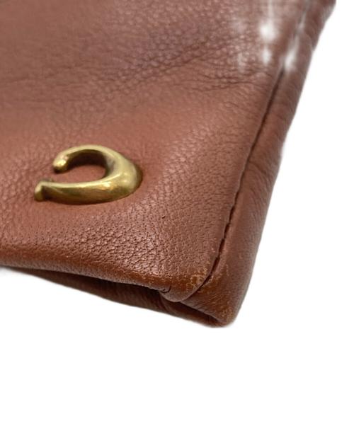 COACH（コーチ）COACH (コーチ) スカルプテッド シグネチャー レザー テック グローブ 76014 ブラウンの古着・服飾アイテム