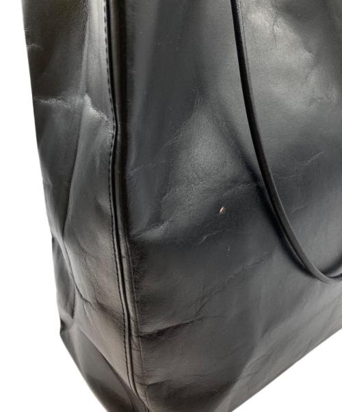 UNKNOWN PRODUCTS（アンノウン プロダクツ）UNKNOWN PRODUCTS (アンノウン プロダクツ) レザー ペーパーバッグ ブラックの古着・服飾アイテム