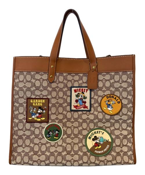 COACH（コーチ）COACH (コーチ) DISNEY (ディズニー) フィールド トート 40・シグネチャー テキスタイル ジャカード・パッチ　CG974 ブラウンの古着・服飾アイテム