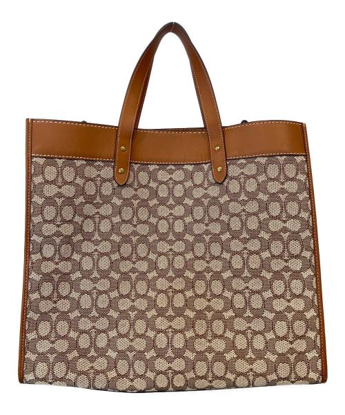COACH（コーチ）COACH (コーチ) DISNEY (ディズニー) フィールド トート 40・シグネチャー テキスタイル ジャカード・パッチ　CG974 ブラウンの古着・服飾アイテム