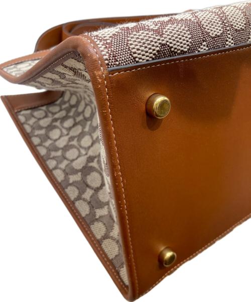 COACH（コーチ）COACH (コーチ) DISNEY (ディズニー) フィールド トート 40・シグネチャー テキスタイル ジャカード・パッチ　CG974 ブラウンの古着・服飾アイテム