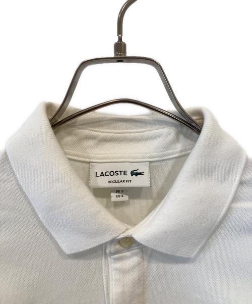 LACOSTE（ラコステ）LACOSTE (ラコステ) 比翼フロントロングスリーブポロシャツ アイボリー サイズ:Sの古着・服飾アイテム