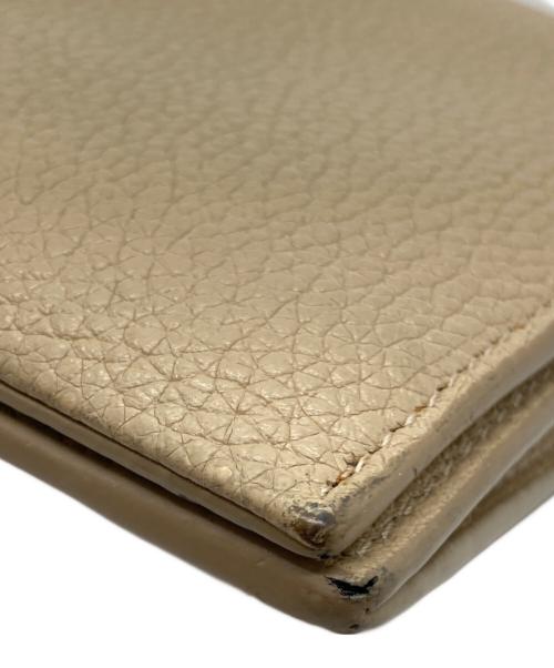 Saint Laurent Paris（サンローランパリ）Saint Laurent Paris (サンローランパリ) サックドジュール フラグメントケース MRT504981・1017 ベージュの古着・服飾アイテム