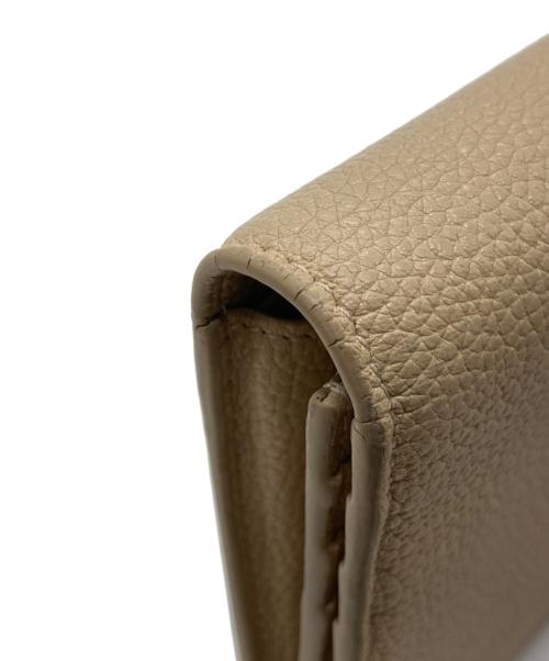 Saint Laurent Paris（サンローランパリ）Saint Laurent Paris (サンローランパリ) サックドジュール フラグメントケース MRT504981・1017 ベージュの古着・服飾アイテム