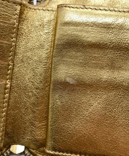 COMME des GARCONS（コムデギャルソン）COMME des GARCONS (コムデギャルソン) 2つ折り財布 SA2100EG 財布 ゴールドの古着・服飾アイテム
