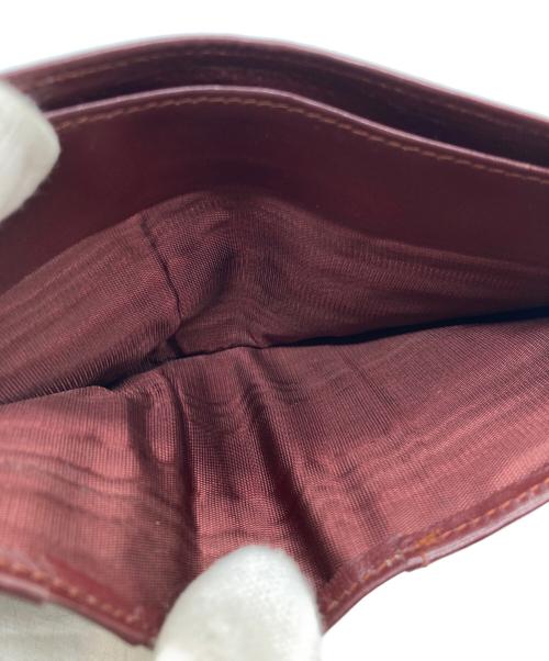 Cartier（カルティエ）Cartier (カルティエ) 2つ折り財布 ボルドーの古着・服飾アイテム