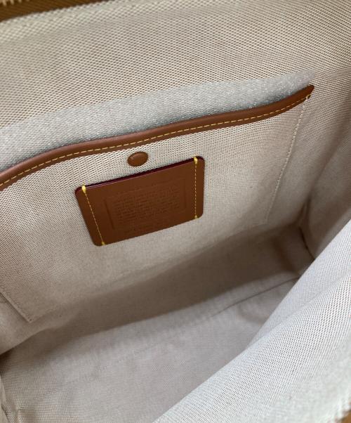 COACH（コーチ）COACH (コーチ) PEANUTS (ピーナッツ) ローグ バッグ・ニュースペーパー プリント/CBF67 ブラウンの古着・服飾アイテム