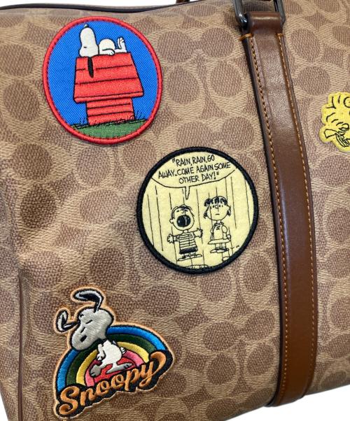 COACH（コーチ）COACH (コーチ) PEANUTS (ピーナッツ) ベンチュラー バッグ・シグネチャー キャンバス・パッチ/CBI42 ベージュの古着・服飾アイテム