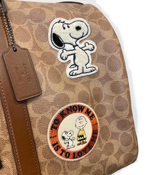 COACH（コーチ）COACH (コーチ) PEANUTS (ピーナッツ) ベンチュラー バッグ・シグネチャー キャンバス・パッチ/CBI42 ベージュの古着・服飾アイテム