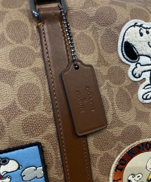 COACH（コーチ）COACH (コーチ) PEANUTS (ピーナッツ) ベンチュラー バッグ・シグネチャー キャンバス・パッチ/CBI42 ベージュの古着・服飾アイテム