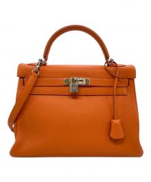HERMES（エルメス）の古着「ケリー32 内縫い/□E刻印/トゴ」｜オレンジ