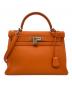 HERMES（エルメス）の古着「ケリー32 内縫い/□E刻印/トゴ」｜オレンジ