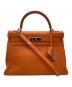 HERMES（エルメス）の古着「ケリー32 内縫い ハンドバッグ」｜オレンジ