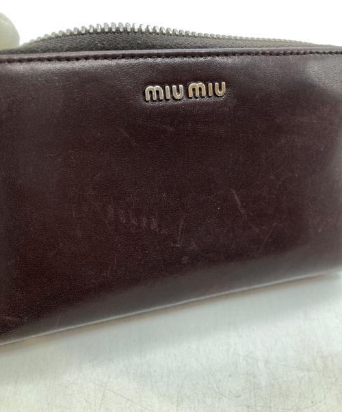 MIU MIU（ミュウミュウ）MIU MIU (ミュウミュウ) ラウンドファスナー財布 195の古着・服飾アイテム