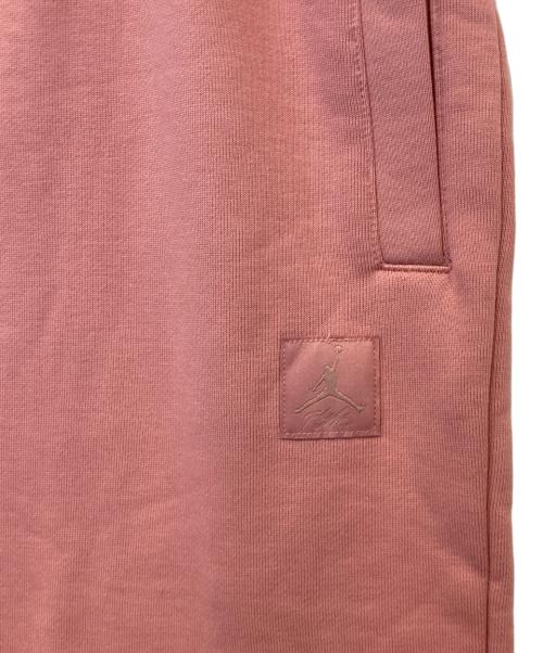 JORDAN（ジョーダン）JORDAN (ジョーダン) FLT FLC PANT RED STARDUST フライト フリース パンツ レッド スターダスト FB5114-618 ピンク サイズ:M 未使用品の古着・服飾アイテム