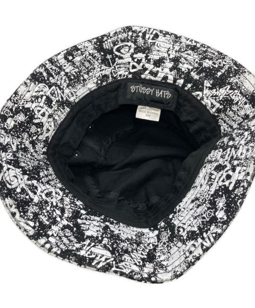 stussy（ステューシー）stussy (ステューシー) グラフィックバケットハット ホワイト×ブラックの古着・服飾アイテム
