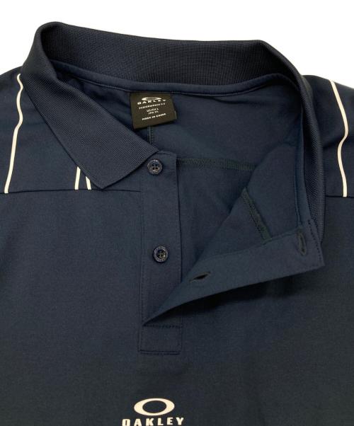 OAKLEY（オークリー）OAKLEY (オークリー) ポロシャツ ネイビー サイズ:XLの古着・服飾アイテム
