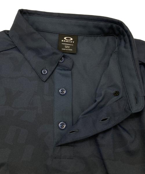 OAKLEY（オークリー）OAKLEY (オークリー) ポロシャツ ネイビー サイズ:XLの古着・服飾アイテム