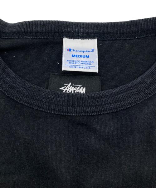 stussy（ステューシー）stussy (ステューシー) Champion (チャンピオン) コラボTシャツ ブラック サイズ:Mの古着・服飾アイテム