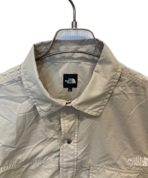 THE NORTH FACE（ザ ノース フェイス）THE NORTH FACE (ザ ノース フェイス) ツ ショートスリーブヌプシシャツ NR22650 ベージュ サイズ:Lの古着・服飾アイテム