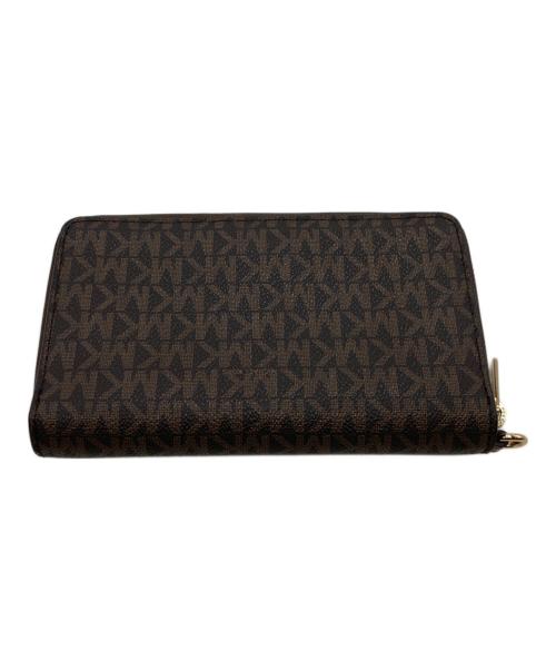 MICHAEL KORS（マイケルコース）MICHAEL KORS (マイケルコース) ジェットセットトラベルスマートフォンリストレット 35F8GTVW9B ブラウンの古着・服飾アイテム