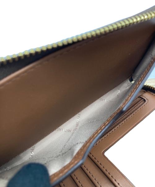 MICHAEL KORS（マイケルコース）MICHAEL KORS (マイケルコース) ジェットセットトラベルスマートフォンリストレット 35F8GTVW9B ブラウンの古着・服飾アイテム