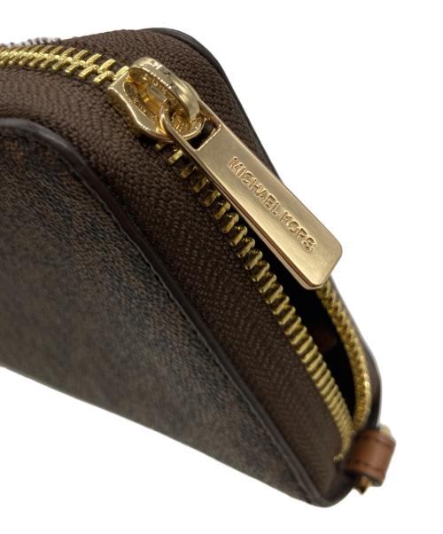 MICHAEL KORS（マイケルコース）MICHAEL KORS (マイケルコース) ジェットセットトラベルスマートフォンリストレット 35F8GTVW9B ブラウンの古着・服飾アイテム