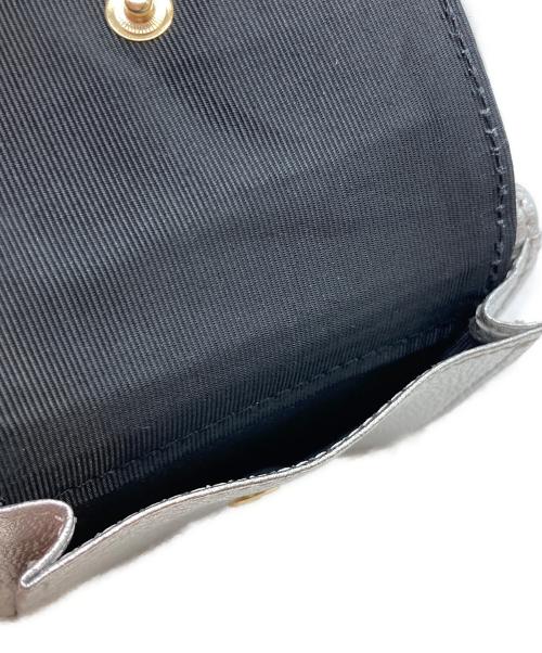 ahcahcum（アチャチュム）ahcahcum (アチャチュム) お目目の財布 シルバーの古着・服飾アイテム