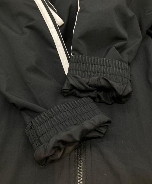 adidas（アディダス）adidas (アディダス) アディカラー ウーブン ファイヤーバード トラックトップ IT2491 ブラック サイズ:Mの古着・服飾アイテム