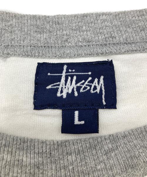 stussy（ステューシー）stussy (ステューシー) ラグランカットソー ホワイト×グレー サイズ:Lの古着・服飾アイテム