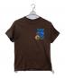 TRAVIS SCOTT（トラヴィススコット）の古着「プリントTシャツ」｜ブラウン