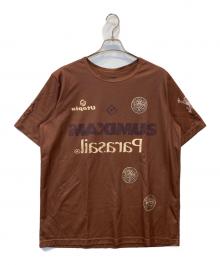 Travis Scott（トラヴィススコット）の古着「プリントTシャツ」｜ブラウン