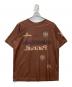 TRAVIS SCOTT（トラヴィススコット）の古着「プリントTシャツ」｜ブラウン