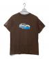 TRAVIS SCOTT（トラヴィススコット）の古着「プリントTシャツ」｜ブラウン