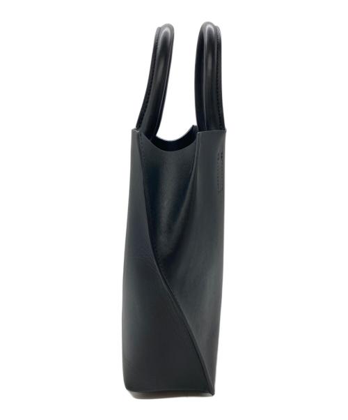 COURTNEY ORLA（コートニーオーラ）COURTNEY ORLA (コートニーオーラ) SLOPE TOTE ブラックの古着・服飾アイテム