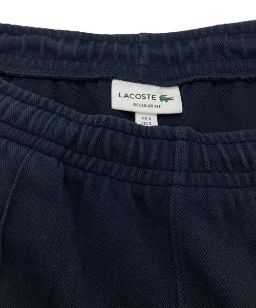 LACOSTE（ラコステ）LACOSTE (ラコステ) ダブルフェイス鹿の子地トラックパンツ　XH7441 ネイビー サイズ:FR3　US5の古着・服飾アイテム