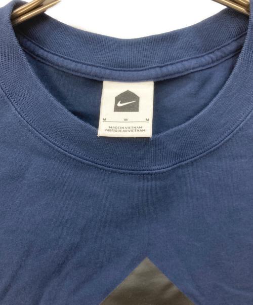 NIKE（ナイキ）NIKE (ナイキ) DOVER STREET MARKET (ドーバー ストリート マーケット) プリントTシャツ ネイビー サイズ:Ⅿの古着・服飾アイテム