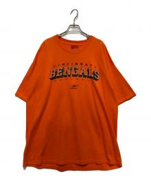 REEBOK（リーボック）の古着「Tシャツ」｜オレンジ