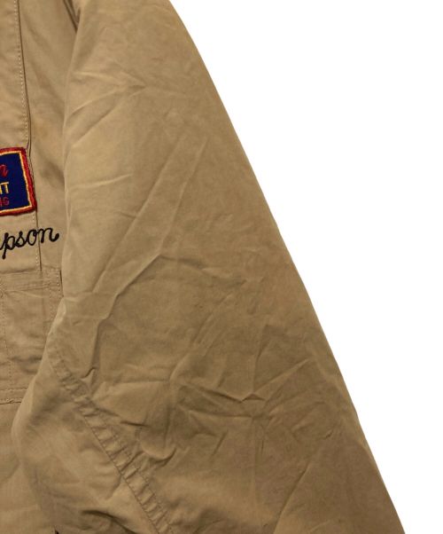 Champion（チャンピオン）Champion (チャンピオン) THE ROEHM-ROEHM CO. (ザ ローム-ローム コー) シューティングジャケット ベージュ サイズ:SIZE48の古着・服飾アイテム
