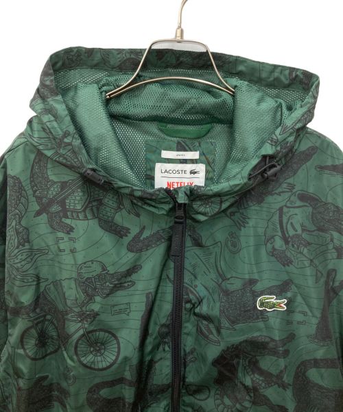 LACOSTE（ラコステ）LACOSTE (ラコステ) NETFLIX (ネットフリックス) 総柄ジップアップジャケット グリーン サイズ:XLの古着・服飾アイテム