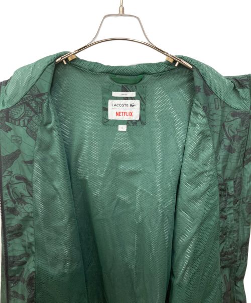 LACOSTE（ラコステ）LACOSTE (ラコステ) NETFLIX (ネットフリックス) 総柄ジップアップジャケット グリーン サイズ:XLの古着・服飾アイテム
